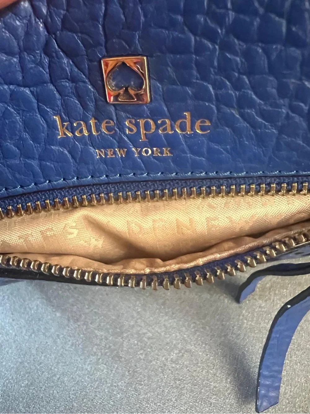 kate spade cobalt blue leather perforated crossbody bag